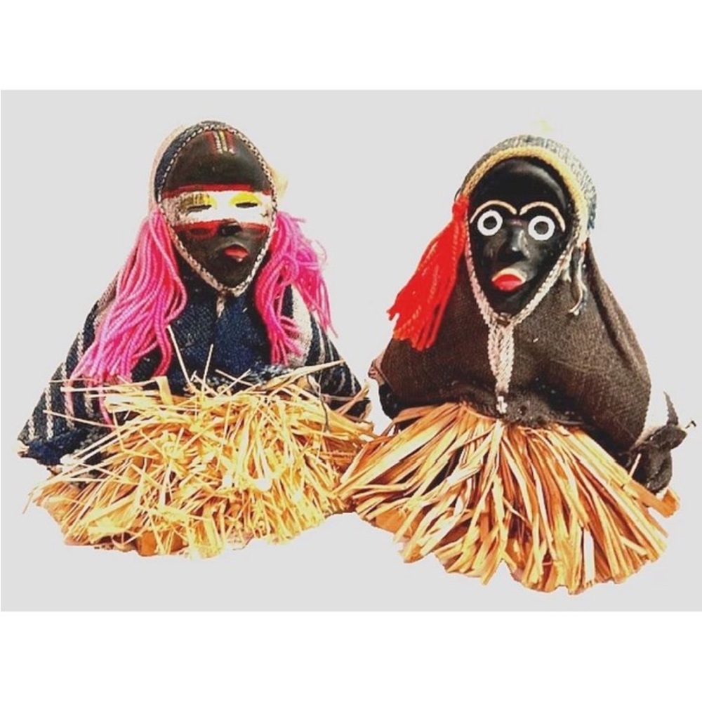 Colorful Tribal Figurines with Straw Skirts